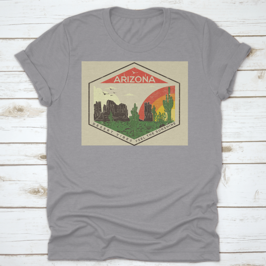 Arizona t-shirt featuring a rainbow, bird, and mountain rock views, showcasing a vibrant desert landscape.