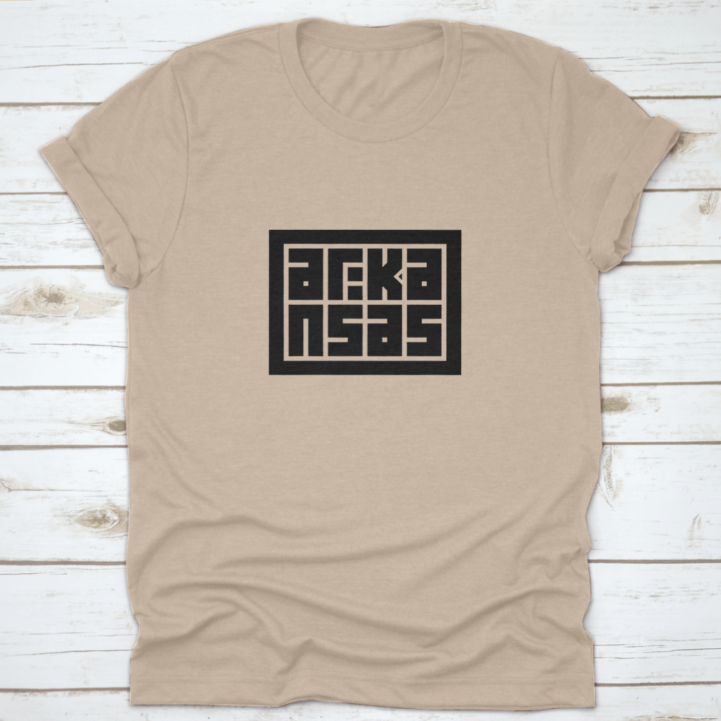 Arkansas Calligraphy Logo in decorative block code style typography on a cotton shirt, showcasing unique design and quality fabric.