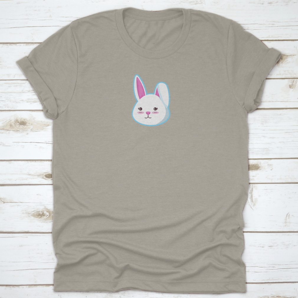 A cute t-shirt featuring a bunny head design with the left ear closed, made from soft cotton fabric.