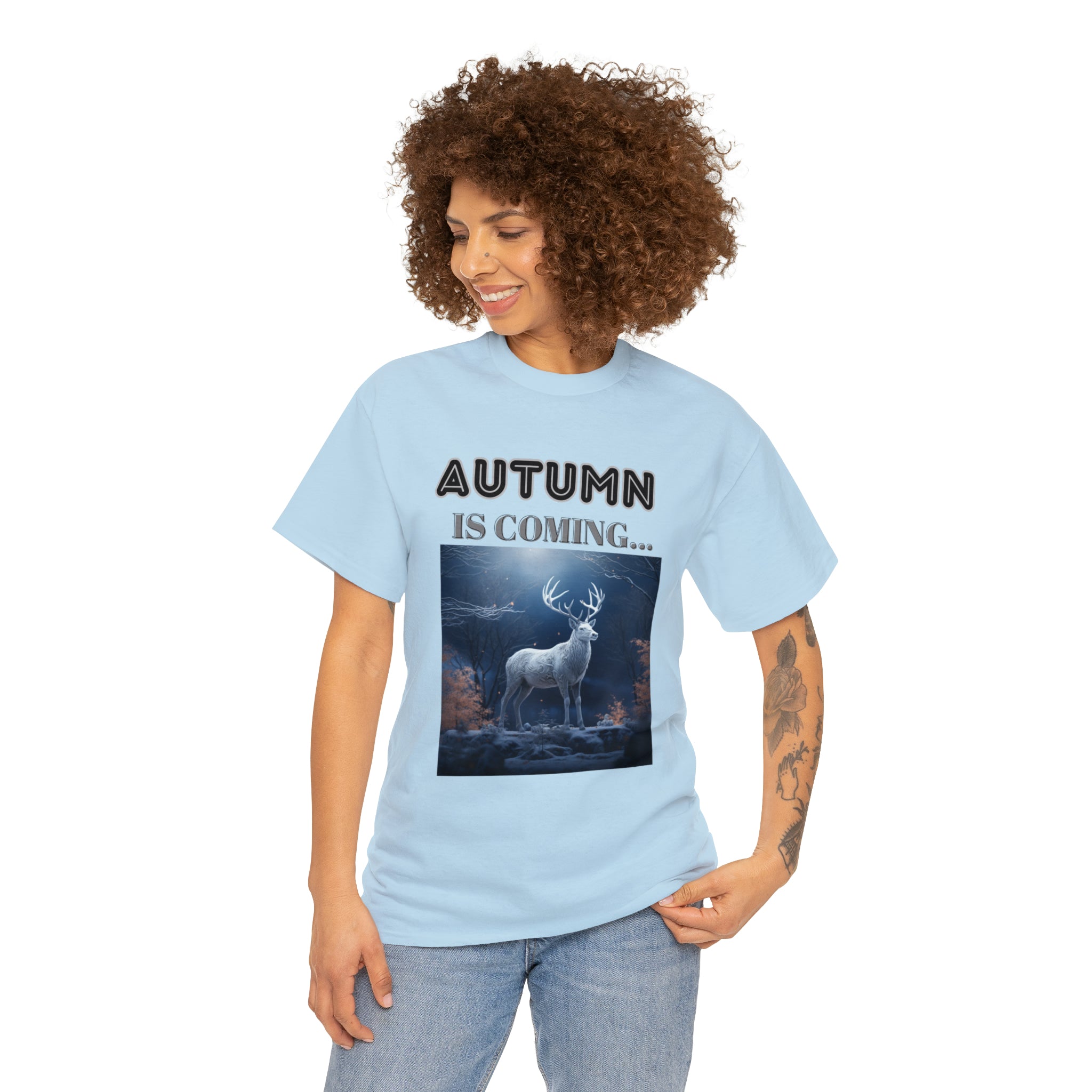 A stylish Fall Vibes T-shirt featuring a serene deer drinking from a brook surrounded by colorful autumn leaves.