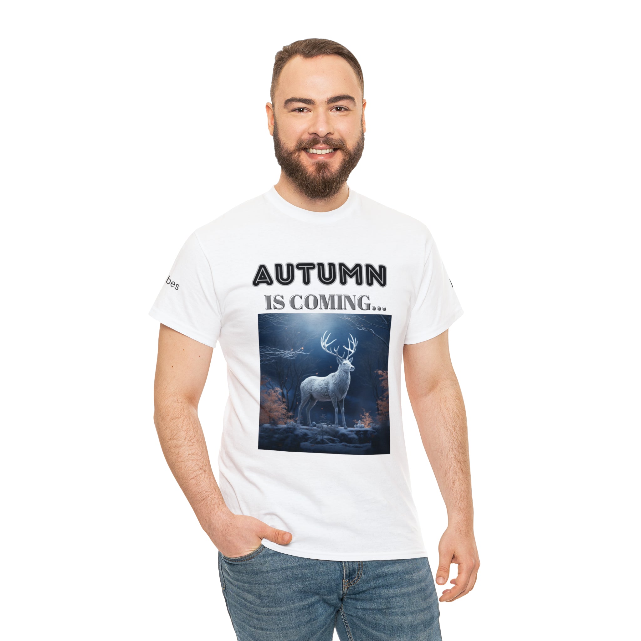 A stylish Fall Vibes T-shirt featuring a serene deer drinking from a brook surrounded by colorful autumn leaves.