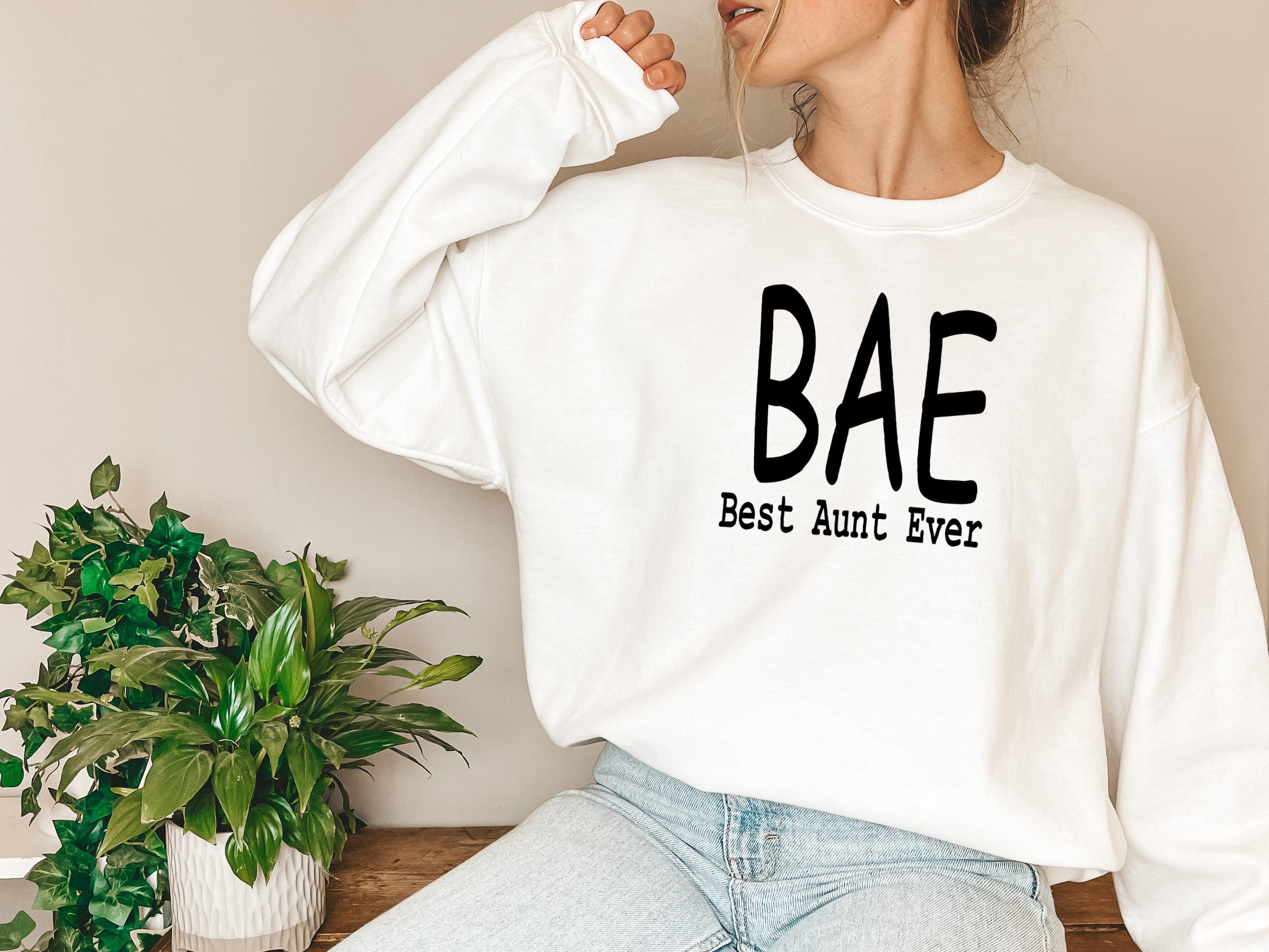 BAE Best Aunt Ever Sweat Shirt featuring a cozy fleece design and adjustable cuffs, perfect for stylish comfort.