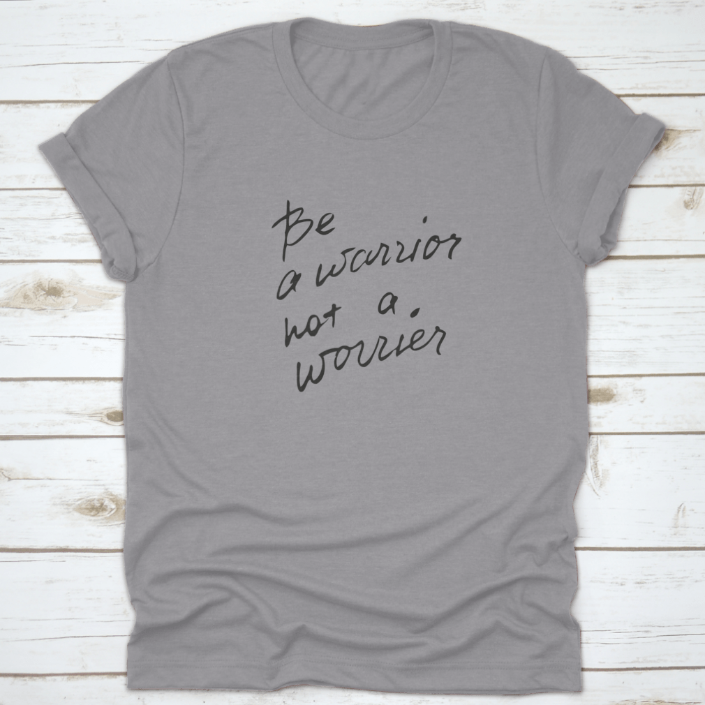 Gray t-shirt with motivational text.