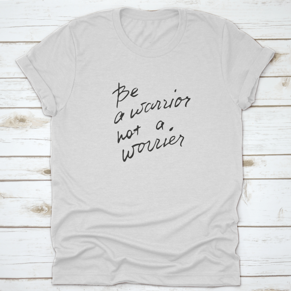 White t-shirt with motivational text.