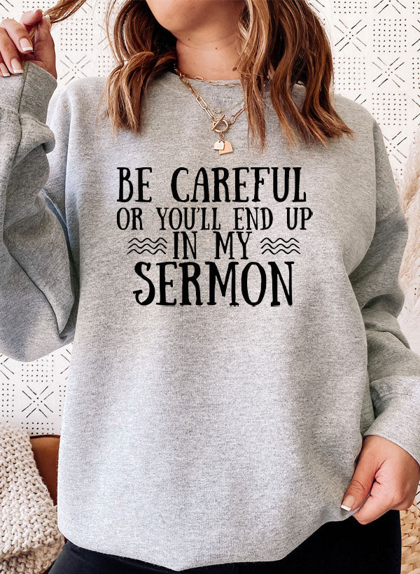 Be Careful Or You'll End Up In My Sermon Sweat Shirt featuring a unique design, cozy fleece lining, and adjustable cuffs.