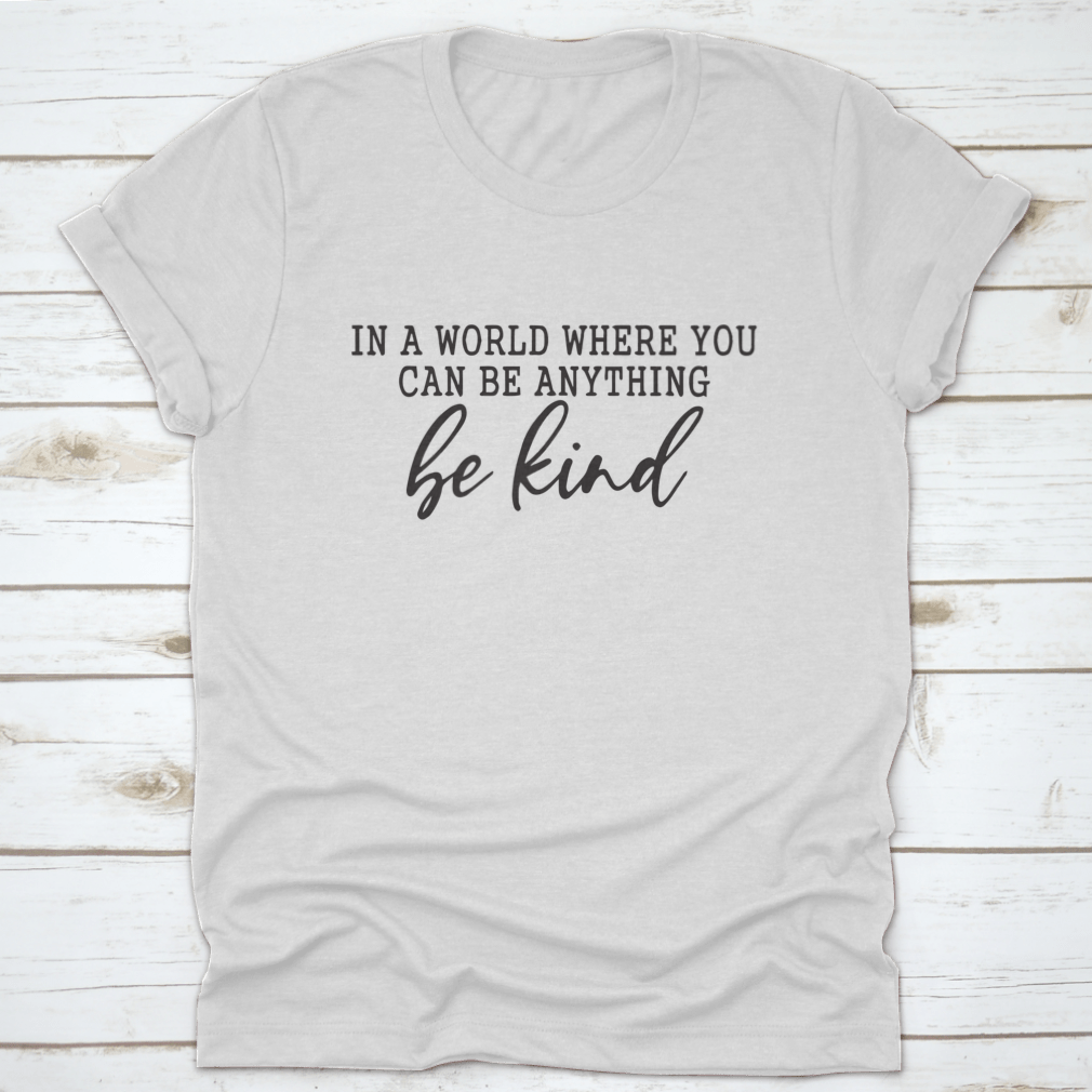 Be Kind Calligraphic Design T-Shirt displayed on a mannequin, showcasing its stylish design and comfortable fit.