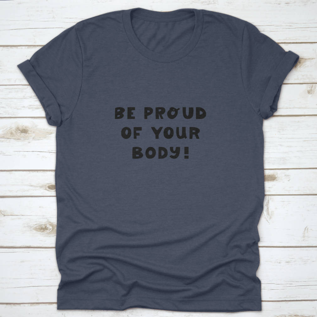 A white t-shirt featuring cute hand-drawn lettering that says 'Be Proud Of Your Body', showcasing a stylish and positive message.