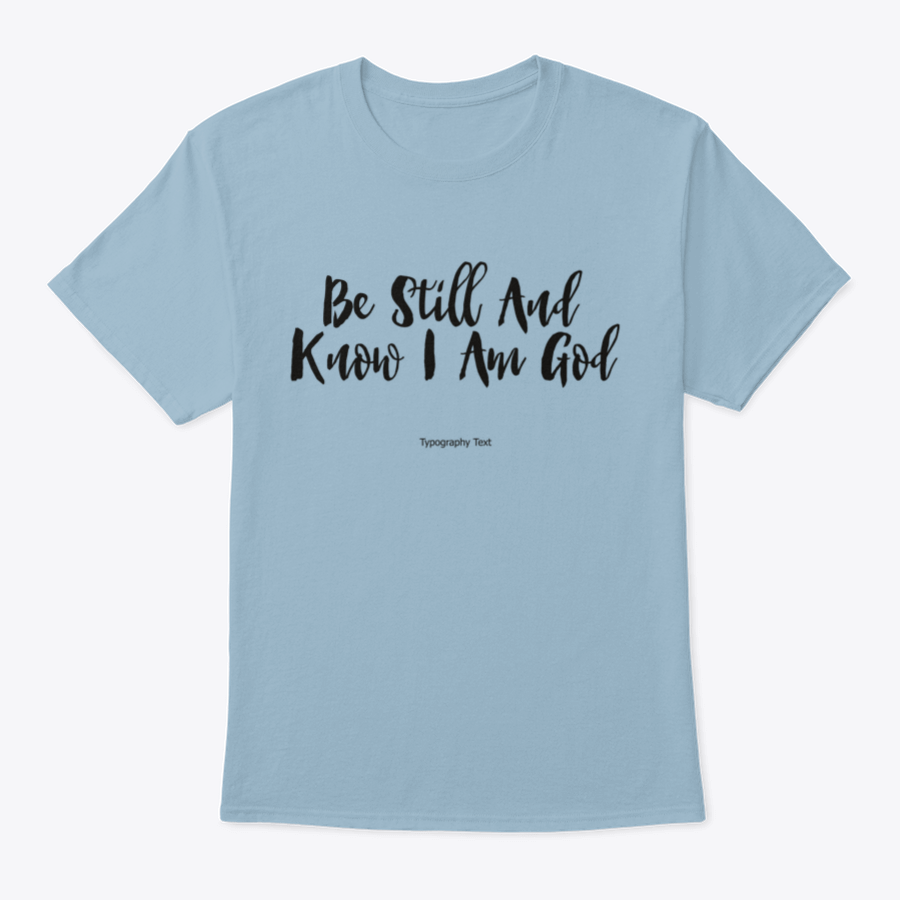 A comfortable T-shirt featuring the bold typography quote 'Be Still And Know I Am God', showcasing its inspirational design and quality fabric.