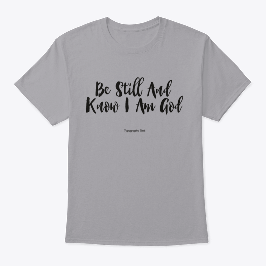A comfortable T-shirt featuring the bold typography quote 'Be Still And Know I Am God', showcasing its inspirational design and quality fabric.