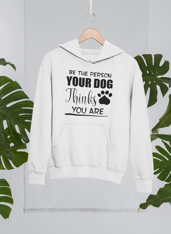 A cozy hoodie featuring the phrase 'Be The Person Your Dog Thinks You Are', designed for dog lovers with an adjustable hood and fleece lining.