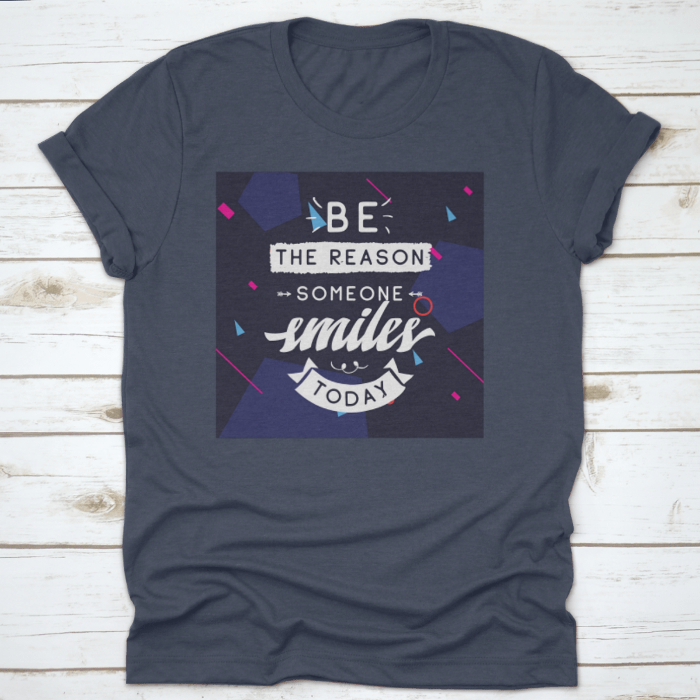 Be The Reason Someone Smiles Today Inspirational Design T-Shirt in a classic fit, made from 100% cotton, featuring a motivational message.