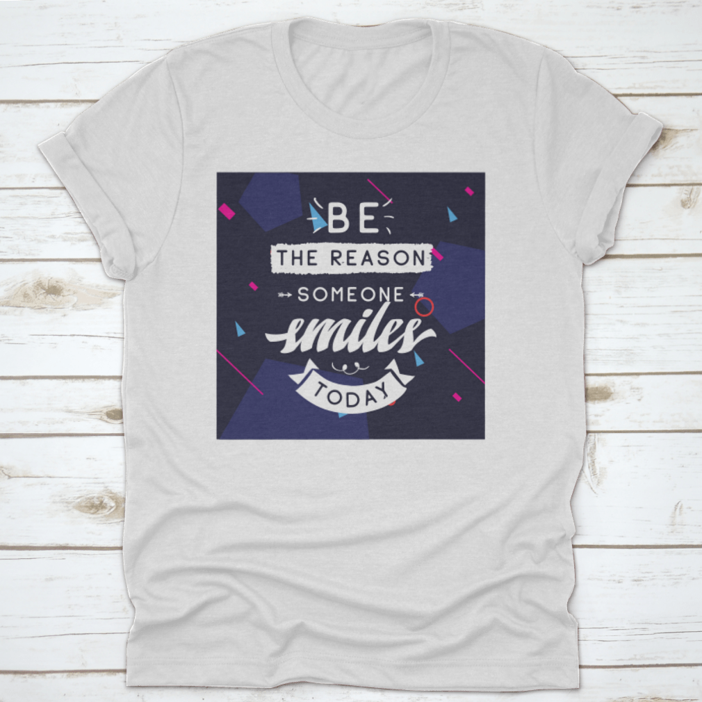 Be The Reason Someone Smiles Today Inspirational Design T-Shirt in a classic fit, made from 100% cotton, featuring a motivational message.