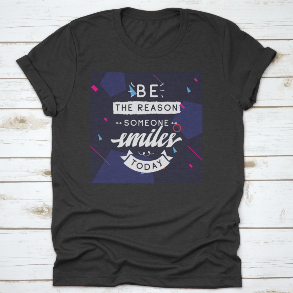 Be The Reason Someone Smiles Today Inspirational Design T-Shirt in a classic fit, made from 100% cotton, featuring a motivational message.