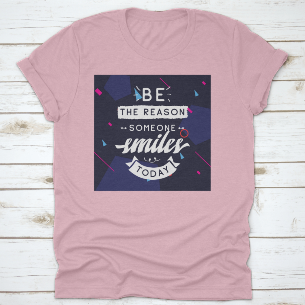Be The Reason Someone Smiles Today Inspirational Design T-Shirt in a classic fit, made from 100% cotton, featuring a motivational message.