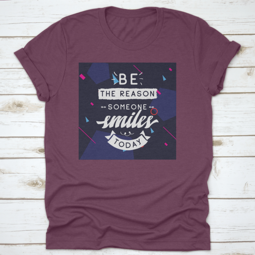 Be The Reason Someone Smiles Today Inspirational Design T-Shirt in a classic fit, made from 100% cotton, featuring a motivational message.