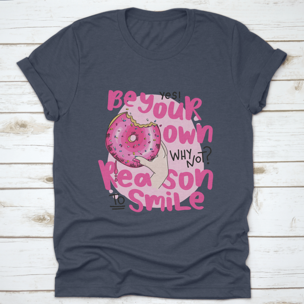 A comfortable and stylish t-shirt featuring the inspiring phrase 'Be Your Own Reason To Smile' printed on the front.
