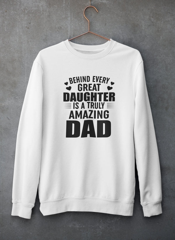 A cozy sweatshirt featuring the phrase 'Behind Every Great Daughter Is a Truly Amazing Dad', made from soft cotton/poly fleece blend.
