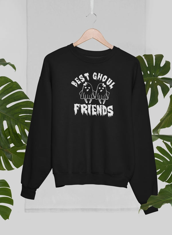 A cozy Best Ghoul Friends Sweat Shirt featuring unique artistic designs, made from a warm cotton/poly fleece blend.