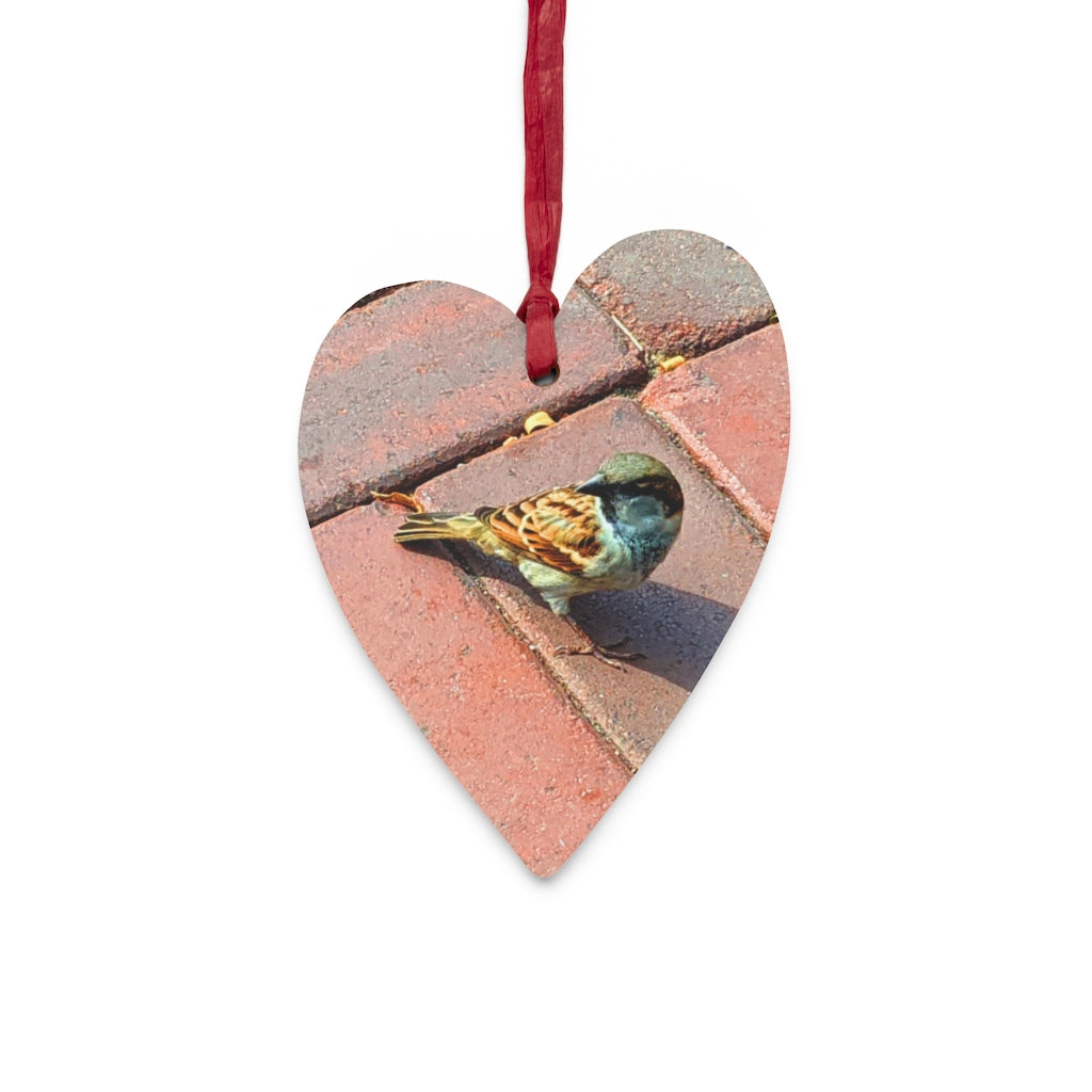 A collection of Bird Wooden Christmas Ornaments in various whimsical shapes, featuring a rustic wood finish and red ribbons for hanging.