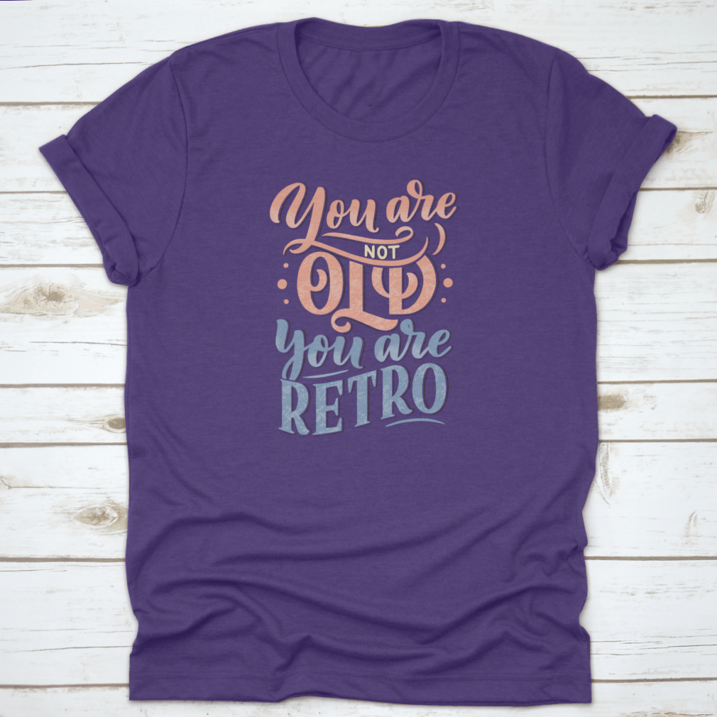 A stylish retro-themed t-shirt featuring birthday lettering design, made from soft cotton fabric, perfect for celebrations.