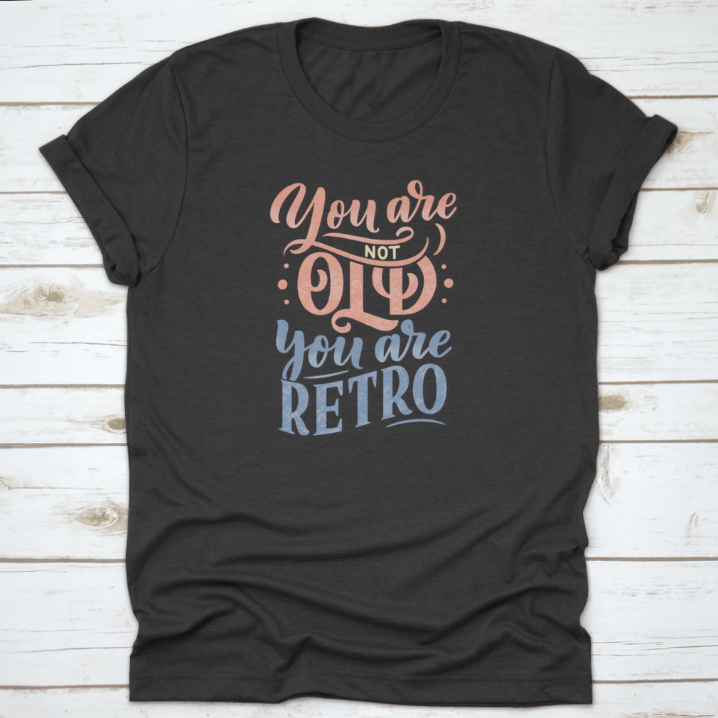 A stylish retro-themed t-shirt featuring birthday lettering design, made from soft cotton fabric, perfect for celebrations.