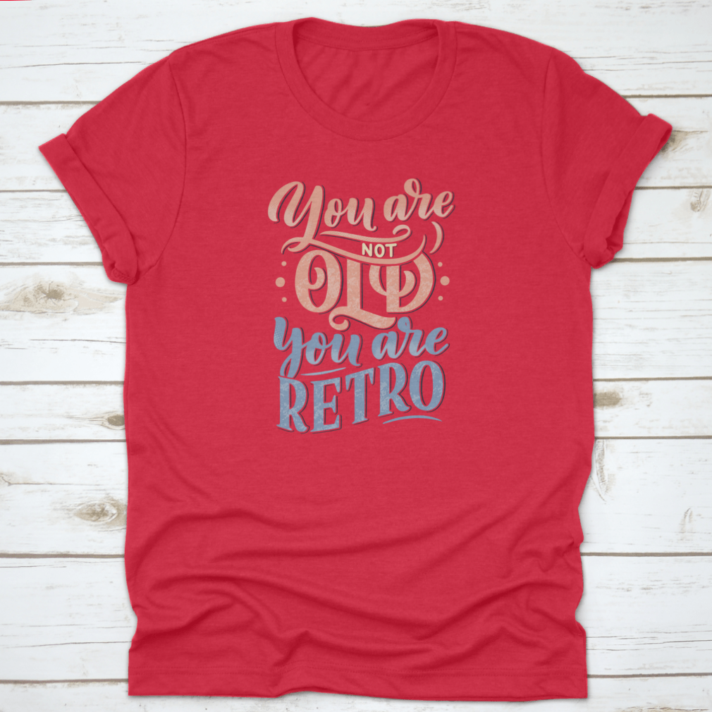 A stylish retro-themed t-shirt featuring birthday lettering design, made from soft cotton fabric, perfect for celebrations.