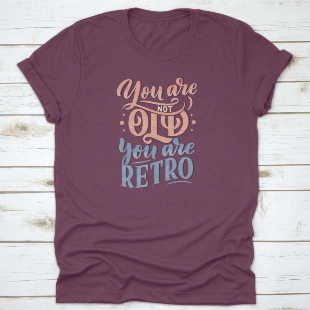A stylish retro-themed t-shirt featuring birthday lettering design, made from soft cotton fabric, perfect for celebrations.