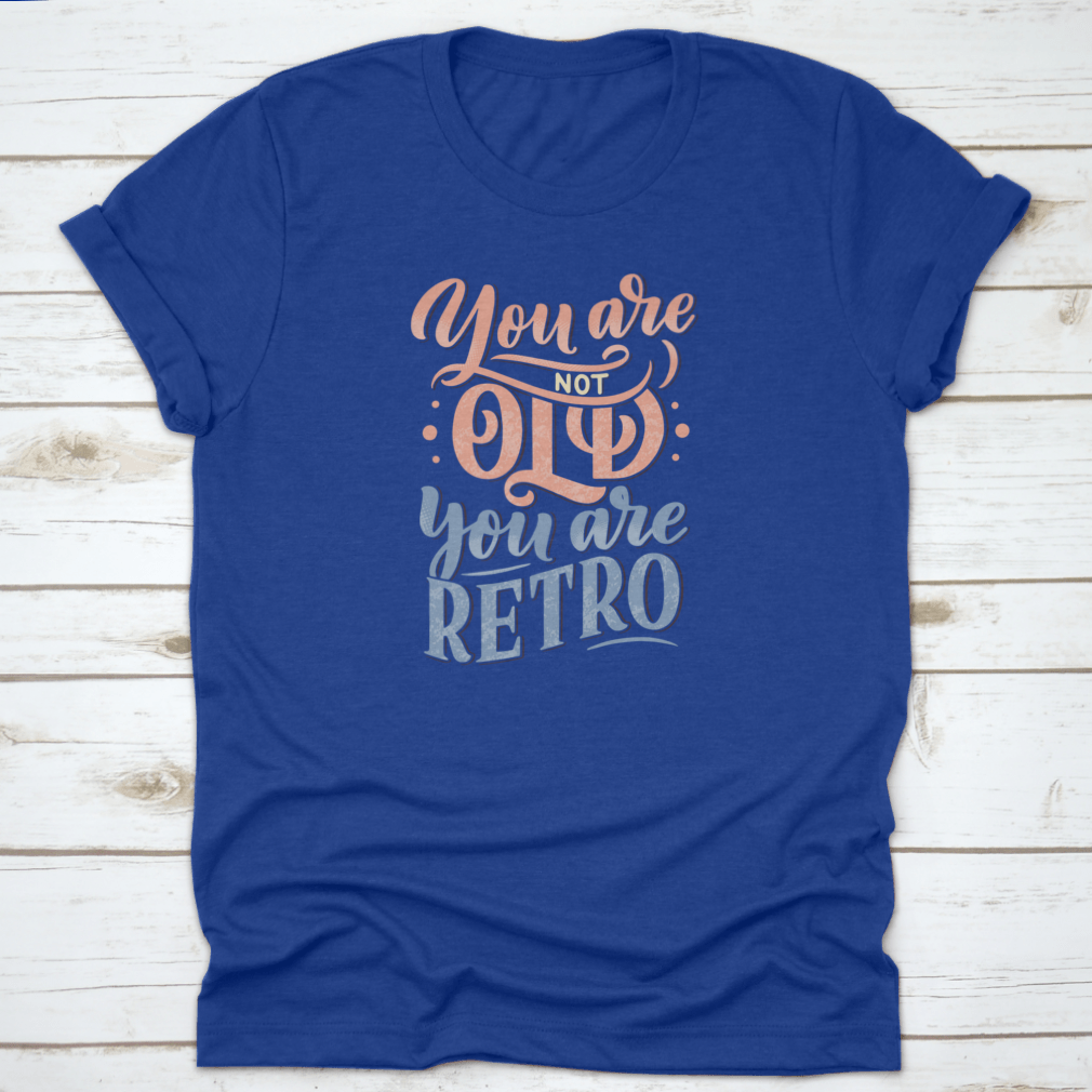 A stylish retro-themed t-shirt featuring birthday lettering design, made from soft cotton fabric, perfect for celebrations.