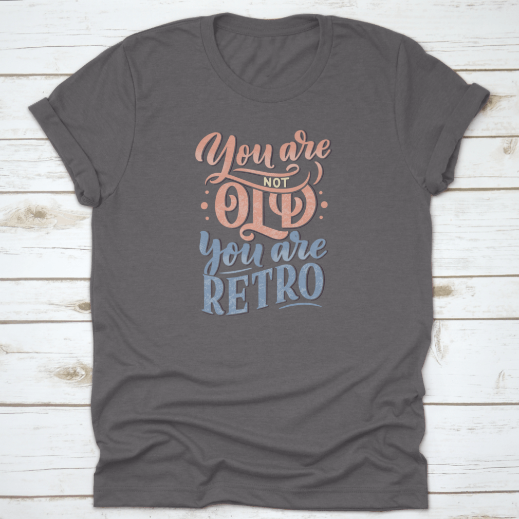 A stylish retro-themed t-shirt featuring birthday lettering design, made from soft cotton fabric, perfect for celebrations.