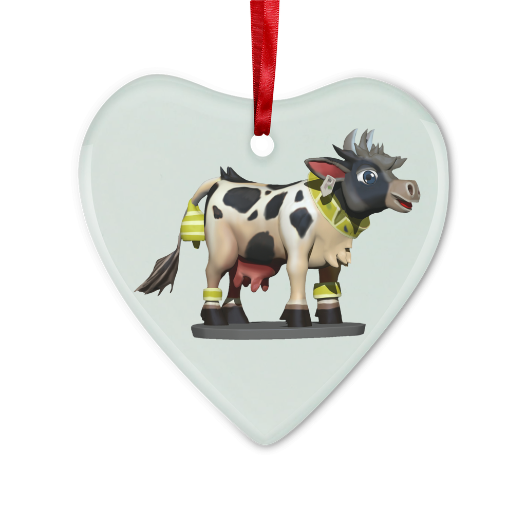 Black and white cow glass hanging ornament with red ribbon and gold string, perfect for Christmas decoration.