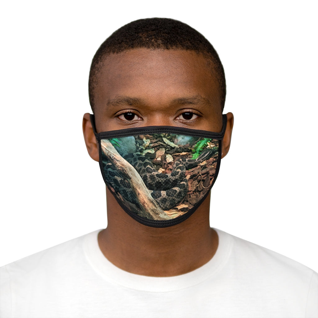Black Brown Snake Mixed-Fabric Face Mask featuring a stylish snake print design with a black outer edge and earloops.