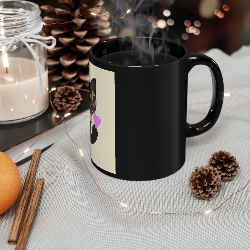 A stylish 11oz black ceramic mug with rounded corners and a C-handle, featuring a full-wrap decoration design.