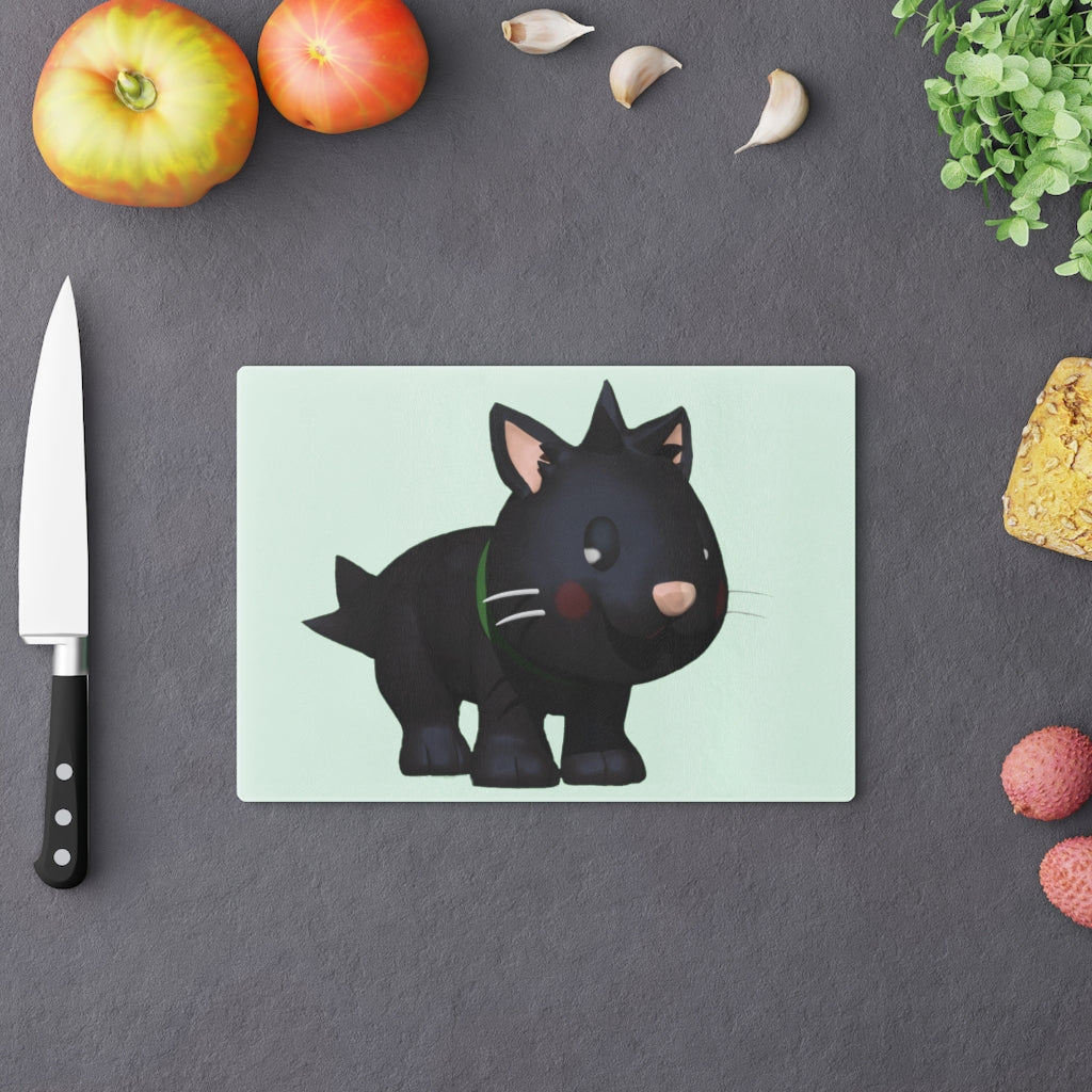A stylish Black Kitty Cutting Board made of tempered glass, featuring a playful black cat design and four rubber dots for stability.