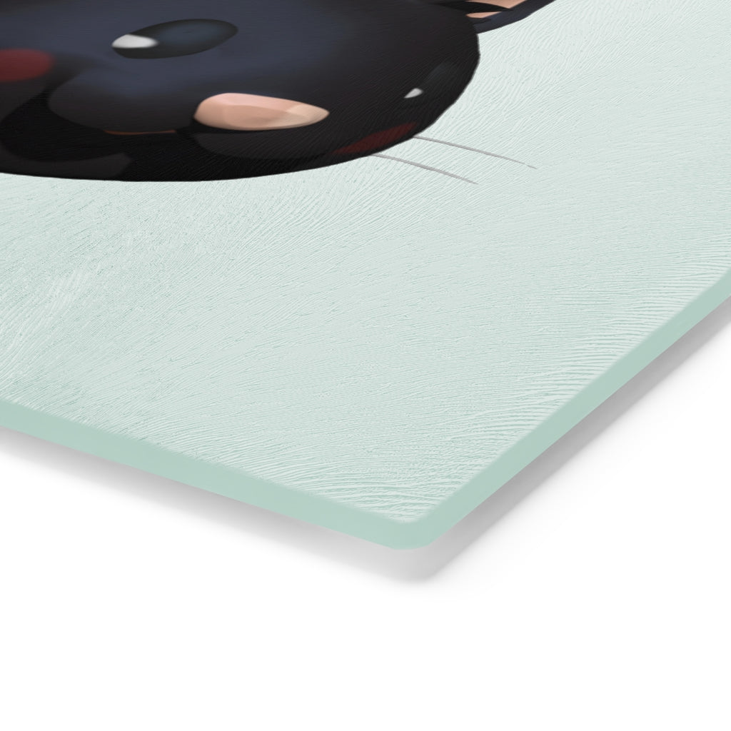 A stylish Black Kitty Cutting Board made of tempered glass, featuring a playful black cat design and four rubber dots for stability.