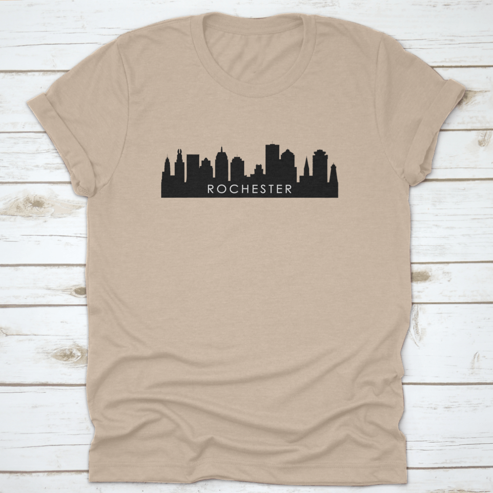 Black outline design of Rochester's city skyline on a cotton t-shirt, showcasing iconic landmarks.