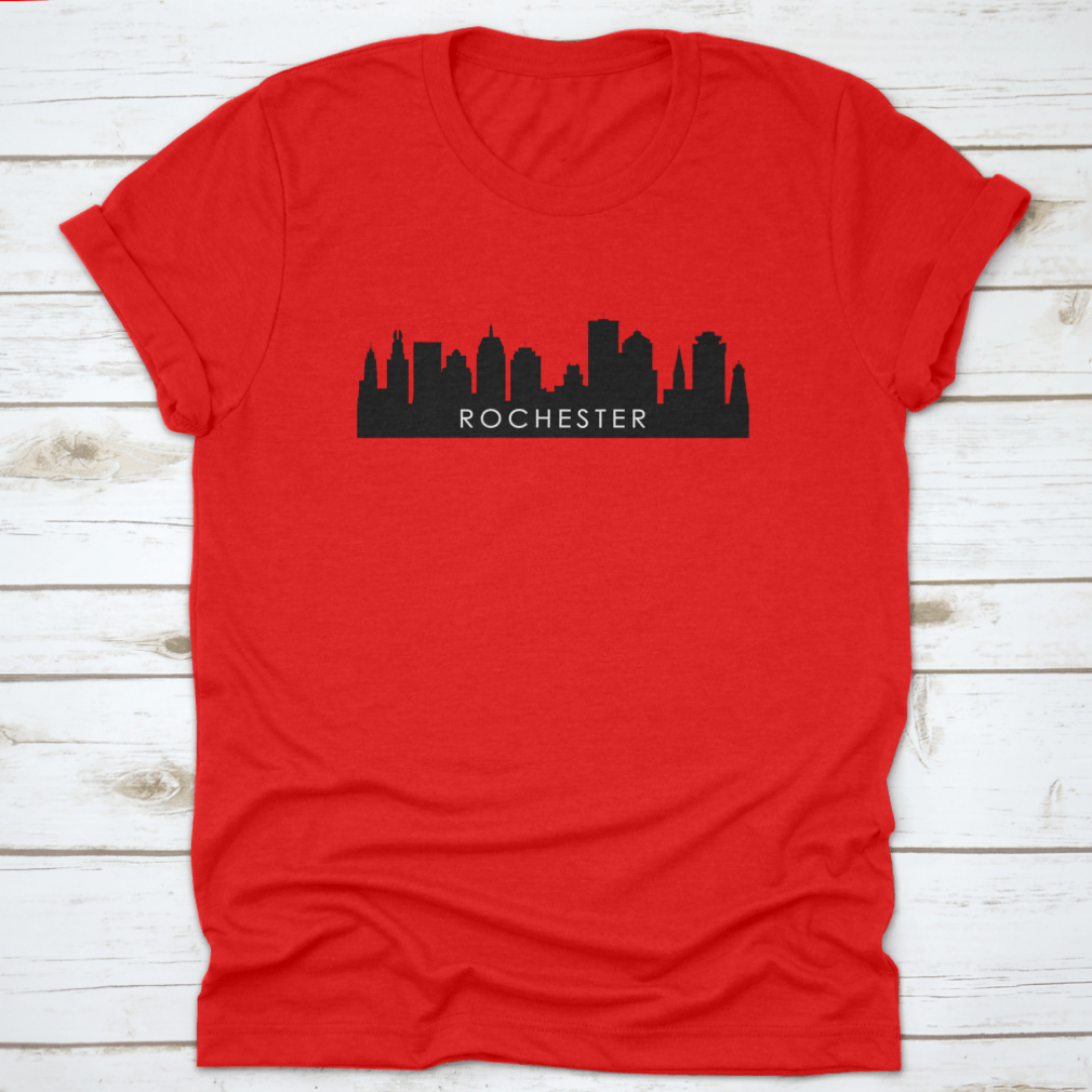 Black outline design of Rochester's city skyline on a cotton t-shirt, showcasing iconic landmarks.
