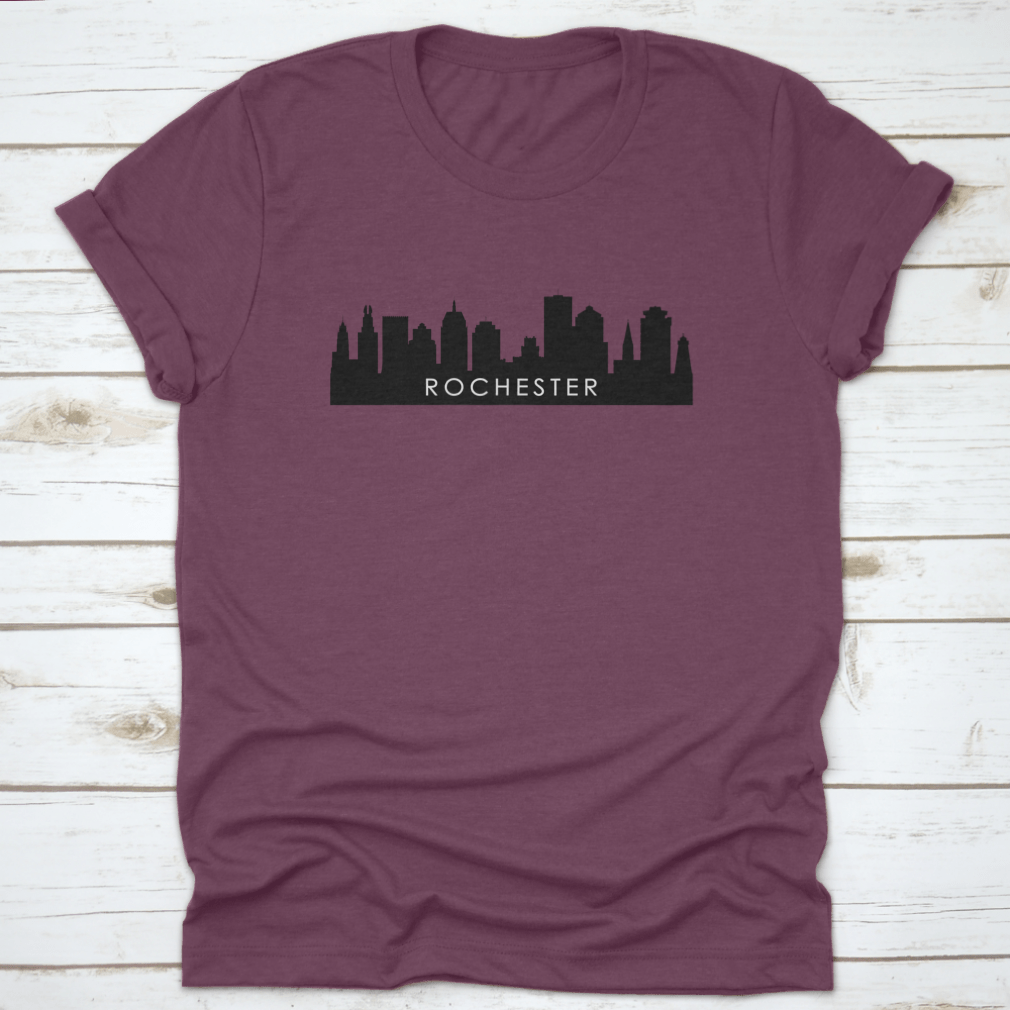 Black outline design of Rochester's city skyline on a cotton t-shirt, showcasing iconic landmarks.