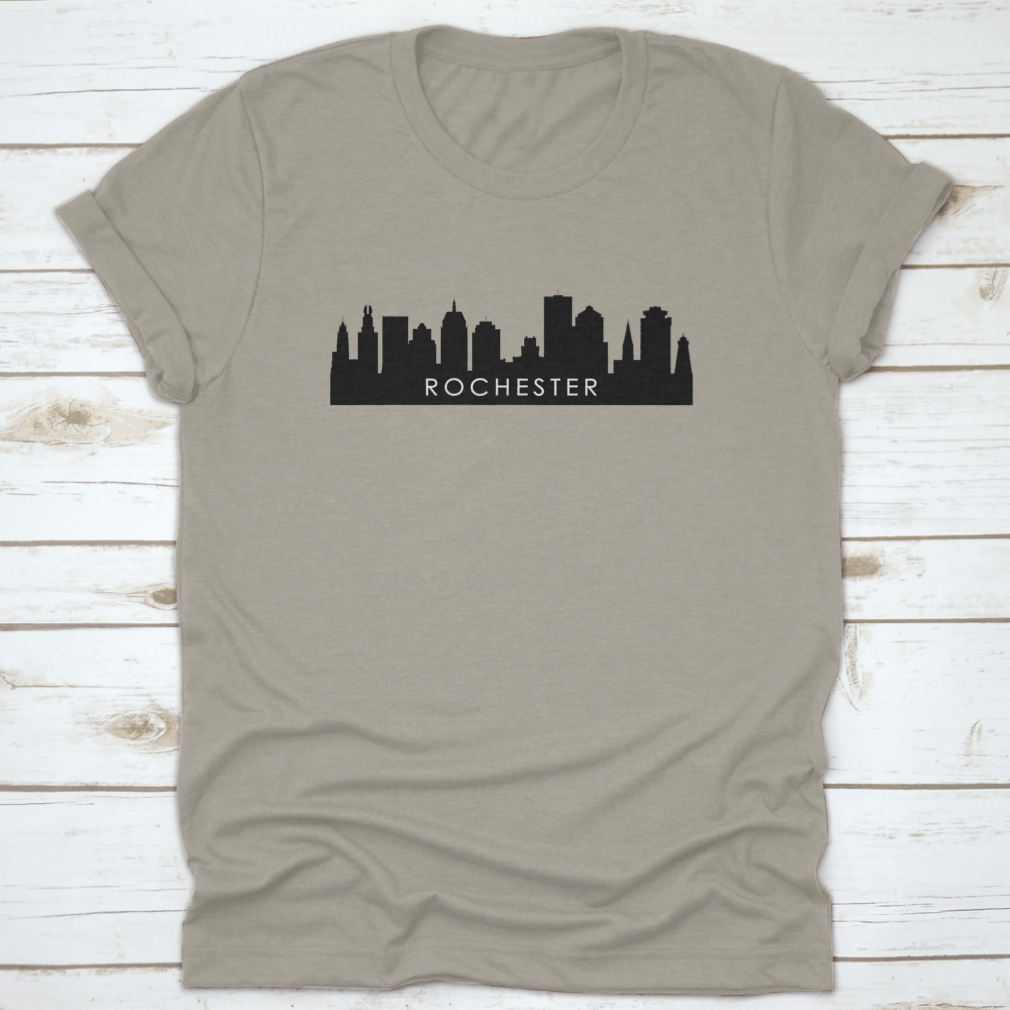 Black outline design of Rochester's city skyline on a cotton t-shirt, showcasing iconic landmarks.
