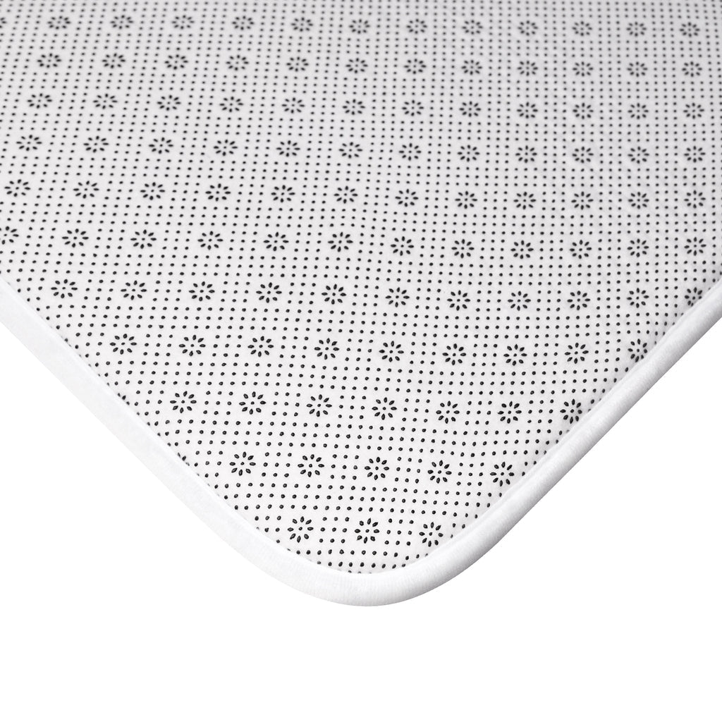 Blazeon Bath Mat featuring a stylish design with anti-slip backing, made from soft microfiber material.