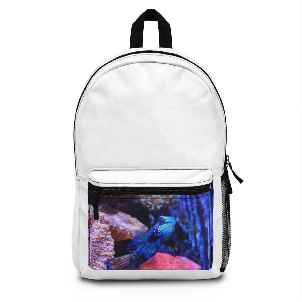 Blue Fish Backpack made from durable spun polyester, featuring adjustable straps and a custom name tag, perfect for outdoor and everyday use.