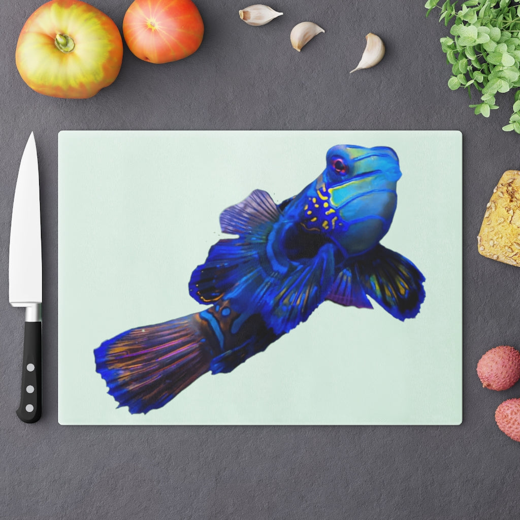A stylish Blue Fish Cutting Board made of tempered glass, featuring a unique fish design and rubber dots for stability.