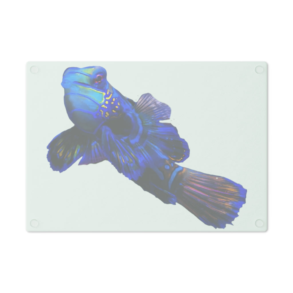 A stylish Blue Fish Cutting Board made of tempered glass, featuring a unique fish design and rubber dots for stability.