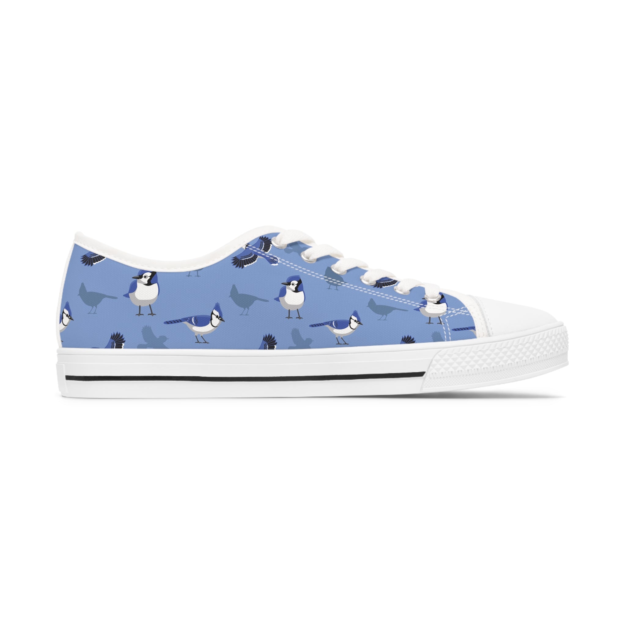 Blue Jay Women's Low Top Sneakers in black and white options, showcasing breathable canvas and stylish design with silver metal eyelets.