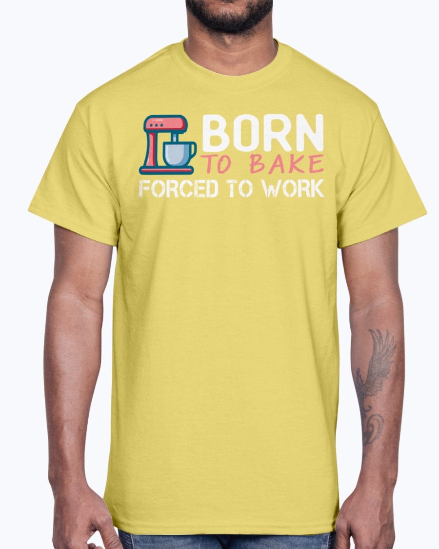 A stylish unisex cotton tee featuring the phrase 'Born To Bake Forced To Work', perfect for baking enthusiasts.