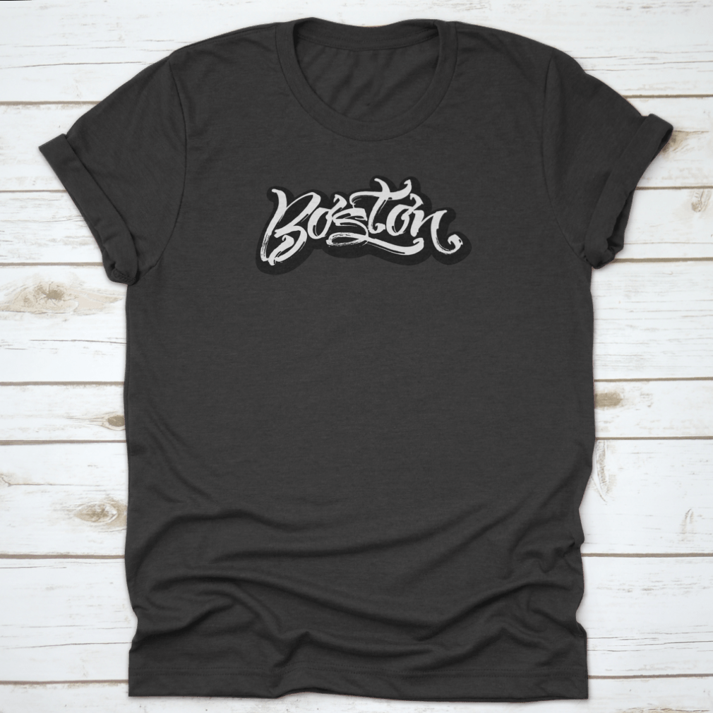 Boston Sticker T-Shirt featuring modern calligraphy design on a soft cotton fabric, perfect for casual wear.