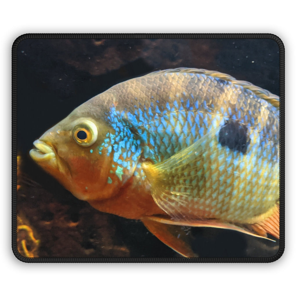 Brown and orange fish design gaming mouse pad with stitched edges, measuring 9x7 inches.