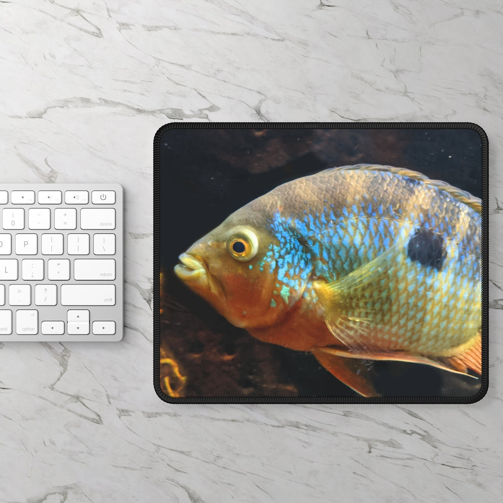 Brown and orange fish design gaming mouse pad with stitched edges, measuring 9x7 inches.