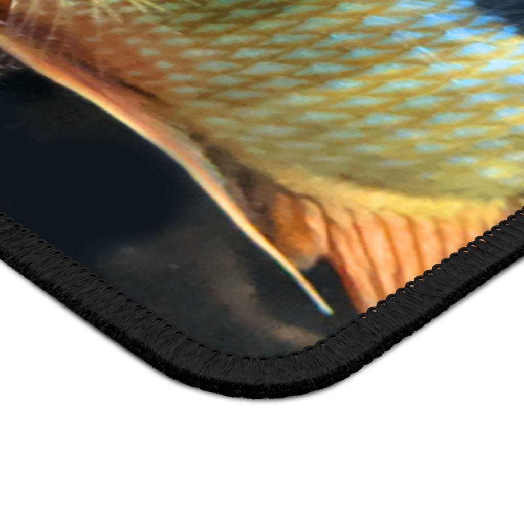 Brown and orange fish design gaming mouse pad with stitched edges, measuring 9x7 inches.