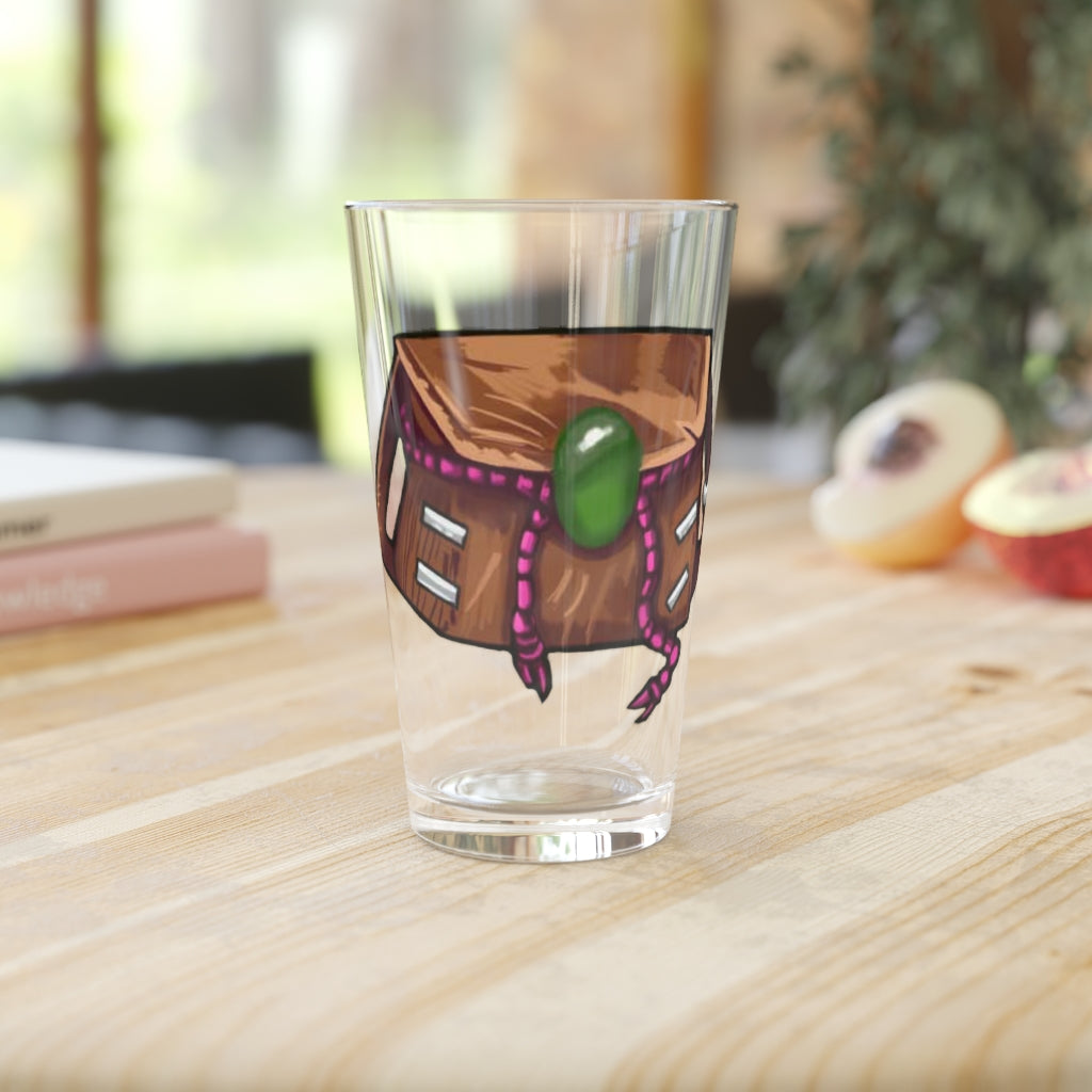 A clear 16oz Brown Bag Pint Glass showcasing its elegant design, perfect for personalized drinks.