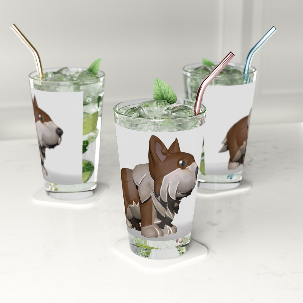 A clear 16oz Brown Dog Pint Glass showcasing a custom printed design, perfect for beverages.